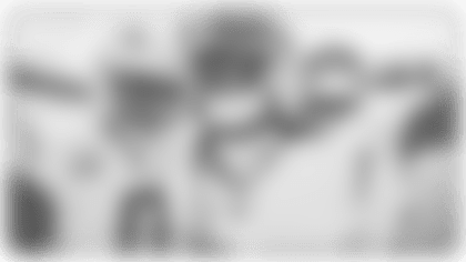 Cornerback Donte Jackson intercepts a pass from Jaguars quarterback Trevor Lawrence.