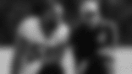 Brandon Graham and Nick Sirianni chat during practice last week.