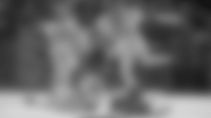 William Frizzell (33) pounces on the loose ball.