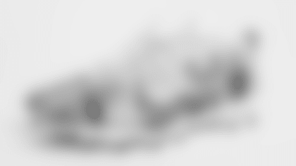 The cleats that Jalyx Hunt will wear Sunday in Dallas.