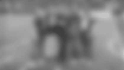 U.S. Navy Lieutenant Commander Ryan Peter with his wife, Laura, and children, Hannah, Brayden and Conner