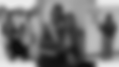 Nazir Stackhouse and brother Ahmeen (left), Stackhouse and mom Rajeeyah Howard, Stackhouse