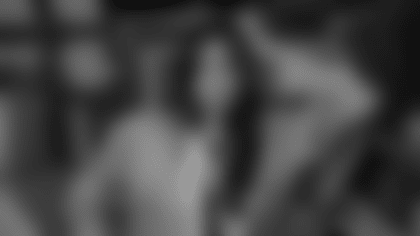 A headshot of Izzy Escobar