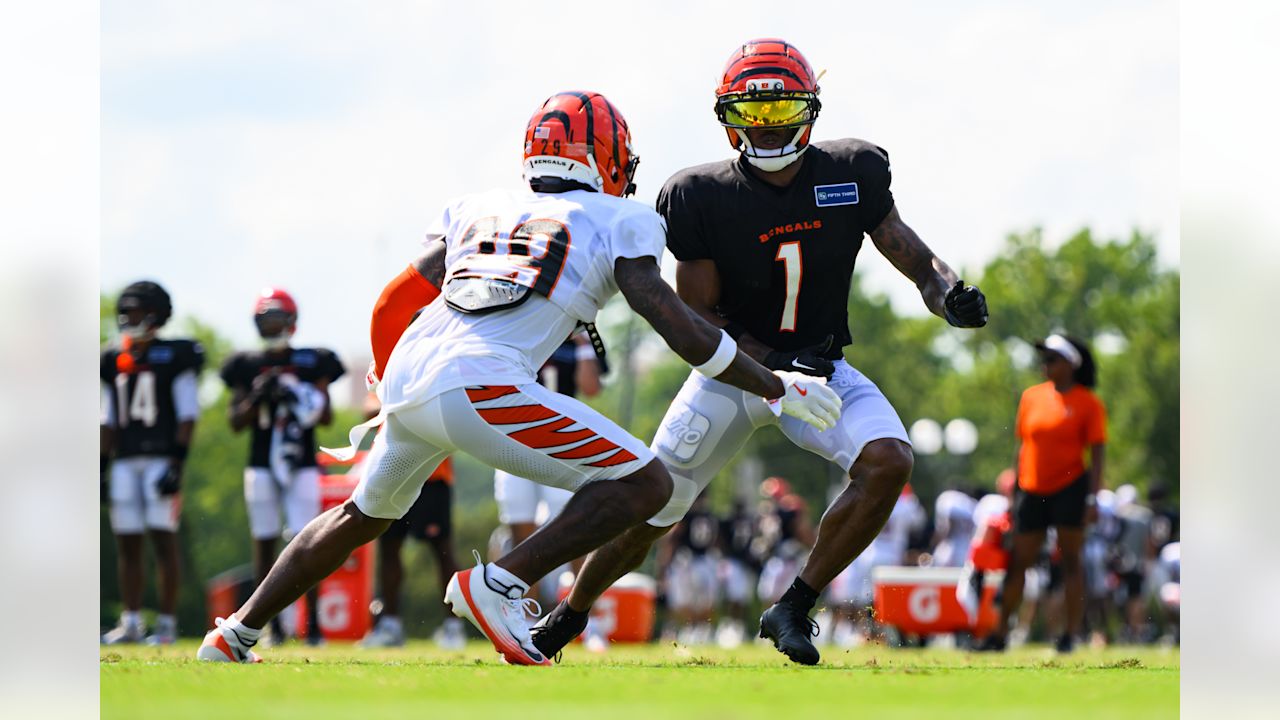 WR Ja'Marr Chase runs a route against CB Cam Taylor-Britt during training camp at Kettering Health Practice Fields, Wednesday, July 30, 2025.