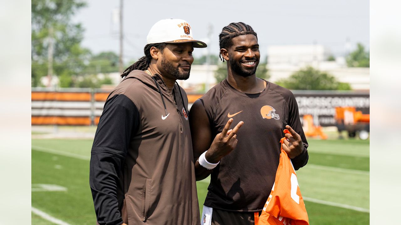 Josh Cribbs and Quarterback Shedeur Sanders (12) during the third day of mandatory minicamp at CrossCountry Mortgage Campus on June 12, 2025.