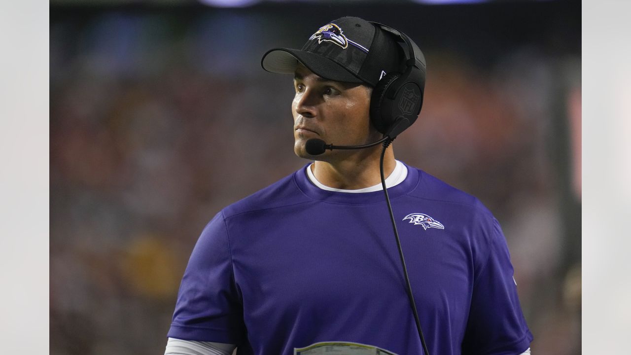 Baltimore Ravens defensive coordinator Mike Macdonald looks on during the first half of an NFL preseason football game between the Washington Commanders and the Baltimore Ravens, Monday, Aug. 21, 2023, in Landover, Md. The Commanders won 29-28. (AP Photo/Julio Cortez)