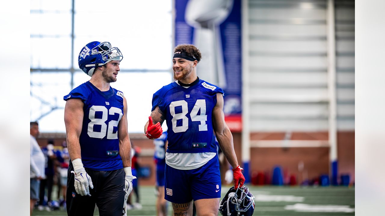 TE Daniel Bellinger (82) and TE Theo Johnson (84)