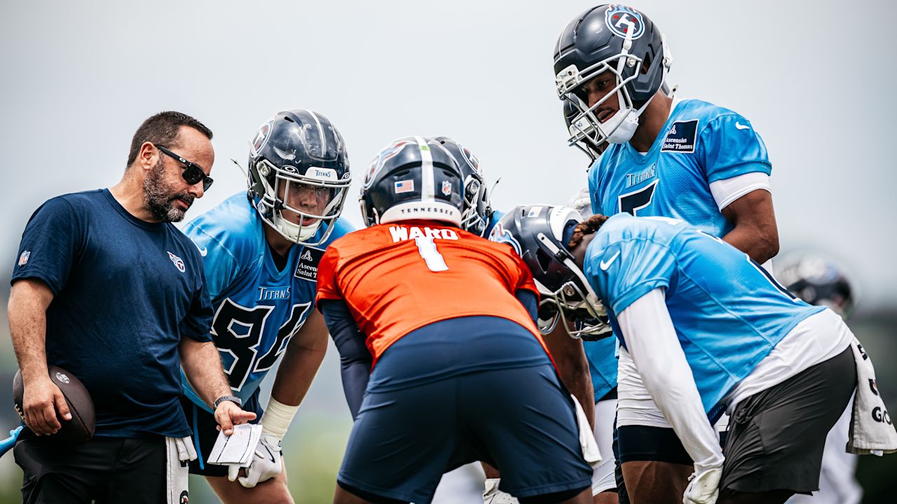 Quarterback Cam Ward #1 of the Tennessee Titans, Tight end Gunnar Helm #84 of the Tennessee Titans, Wide receiver Elic Ayomanor #5 of the Tennessee Titans, Running back Tyjae Spears #2 of the Tennessee Titans and Head Equipment Manager Joey Barranco of the Tennessee Titans in the huddle during phase 3 practice at the Ascension Saint Thomas Sports Park on June 5, 2025 in Nashville, TN. Photo By Donald Page/Tennessee Titans