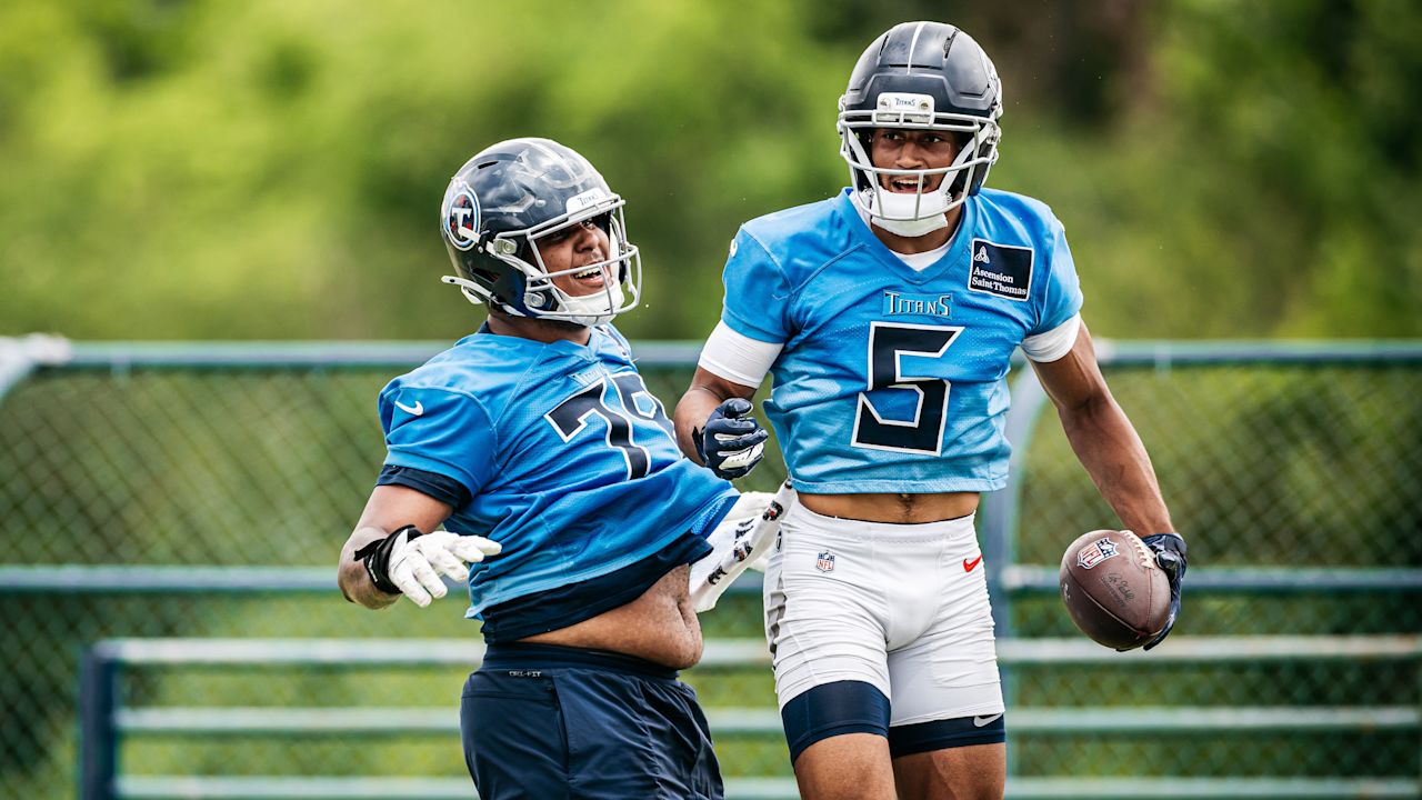 Tackle Brandon Crenshaw-Dickson #78 of the Tennessee Titans and Wide receiver Elic Ayomanor #5 of the Tennessee Titans during phase 3 practice at the Ascension Saint Thomas Sports Park on June 5, 2025 in Nashville, TN. Photo By Donald Page/Tennessee Titans