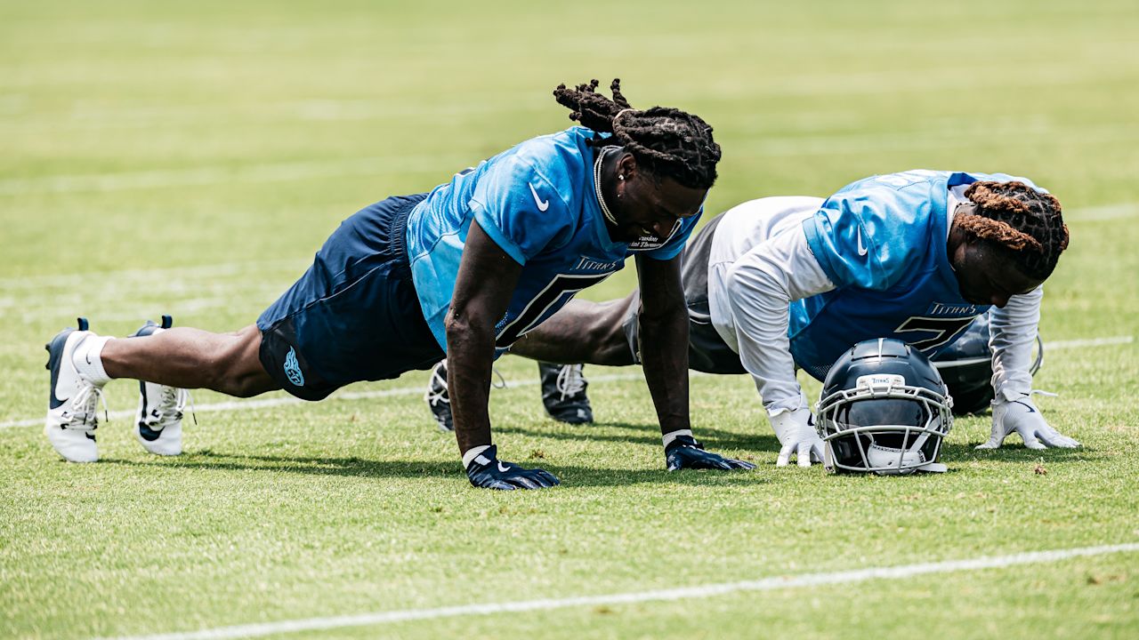 Wide receiver Calvin Ridley #0 of the Tennessee Titans and Running back Tyjae Spears #2 of the Tennessee Titans push ups during minicamp practice at the Ascension Saint Thomas Sports Park on June 11, 2025 in Nashville, TN. Photo By Donald Page/Tennessee Titans