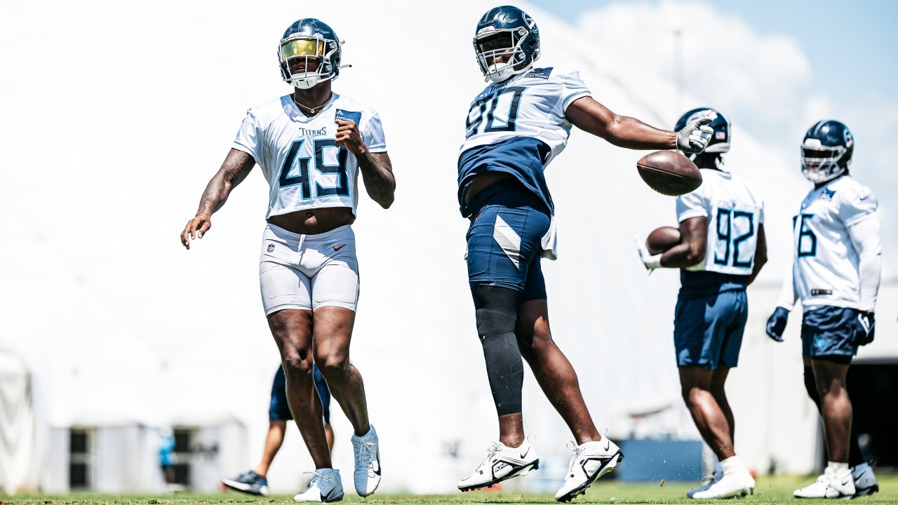 Outside linebacker Arden Key #49 of the Tennessee Titans and Defensive tackle Marlon Davidson #90 of the Tennessee Titans during OTA practice at the Ascension Saint Thomas Sports Park on May 28, 2024 in Nashville, TN. Photo By Donald Page/Tennessee Titans