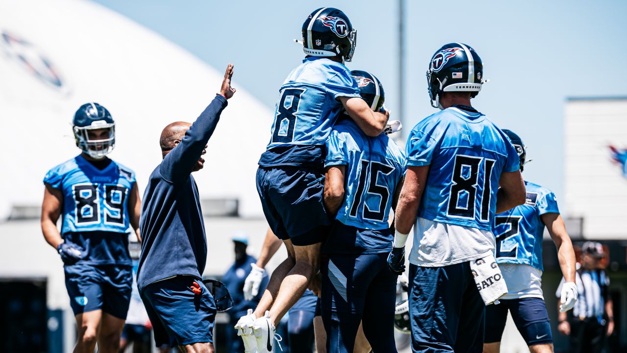 Wide receiver Kyle Philips #18 of the Tennessee Titans, Wide receiver Nick Westbrook-Ikhine #15 of the Tennessee Titans and Tight end Josh Whyle #81 of the Tennessee Titans celebrate during OTA practice at the Ascension Saint Thomas Sports Park on June 11, 2024 in Nashville, TN. Photo By Donald Page/Tennessee Titans