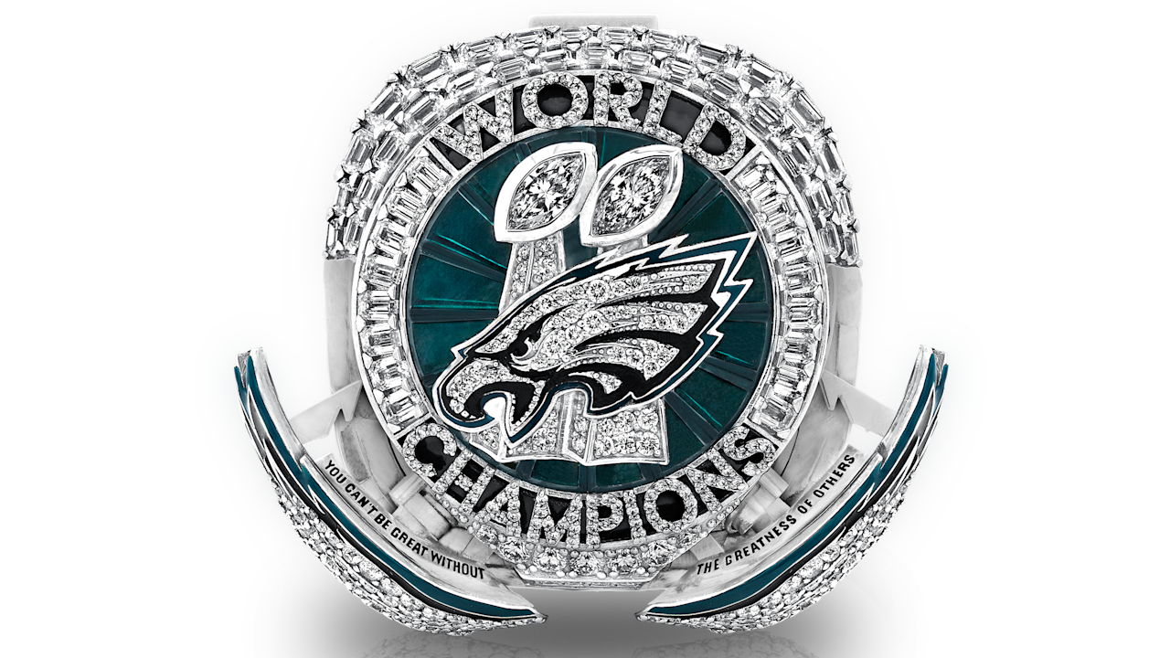 Bordering each side are wings that release from the bezel by pressing a special button located at the top of the ring – a first-of-its-kind feature in a championship ring. When the opening mechanism releases the wings, the inscription "YOU CAN'T BE GREAT WITHOUT THE GREATNESS OF OTHERS" becomes visible, honoring Head Coach Nick Sirianni's message of unity and selflessness.