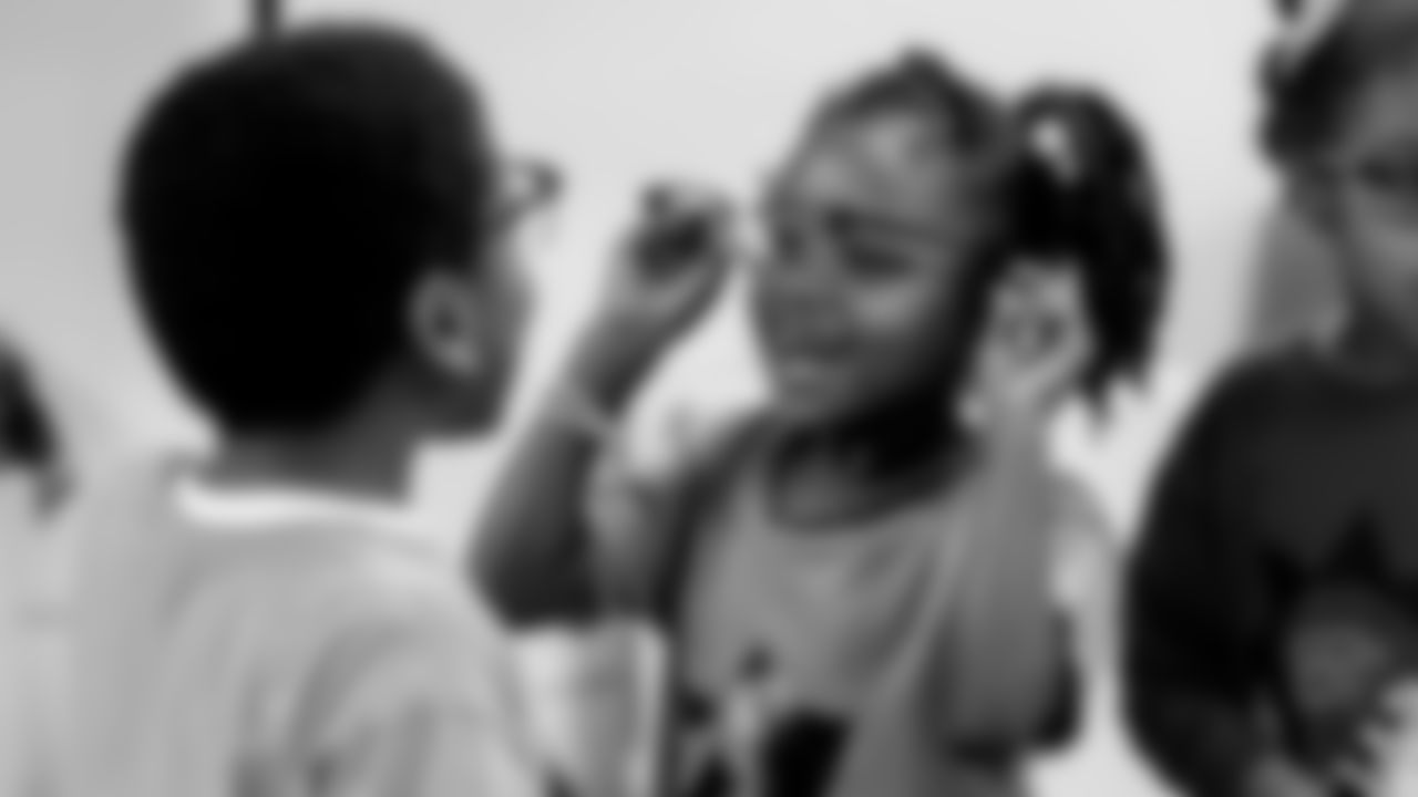 Curtis Robinson Hosts "A Cut Above" Wellness Event for Kids' Health & Vision