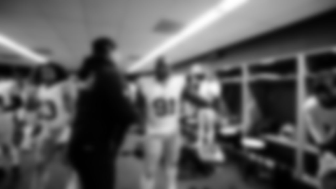 Defensive line coach Kris Kocurek, DL Sam Okuayinonu