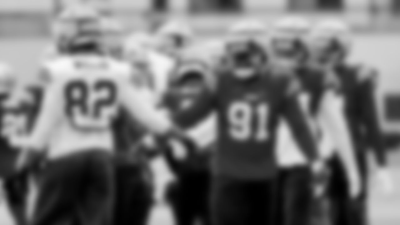 TE Brayden Willis, DL Sam Okuayinonu