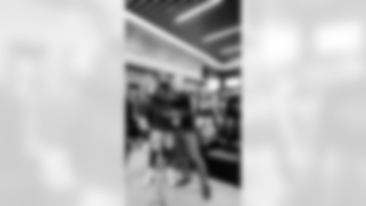 T Trent Williams, President of Football Operations/General Manager John Lynch