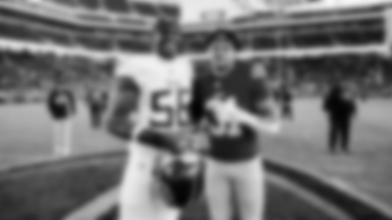 Tennessee Titans OLB Truman Jones, RB Isaac Guerendo