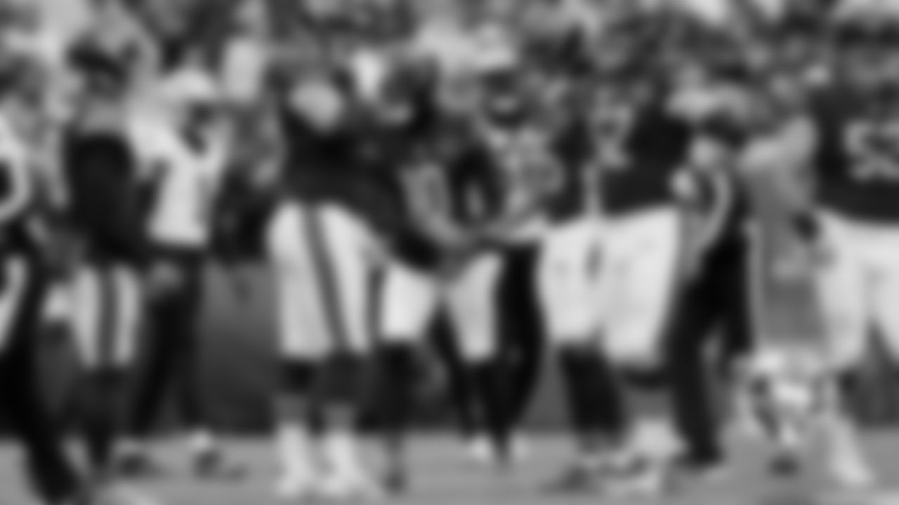 Bears players also sported pink accessories like cleats and gloves during Sunday's game, including rookie receiver Luther Burden III.