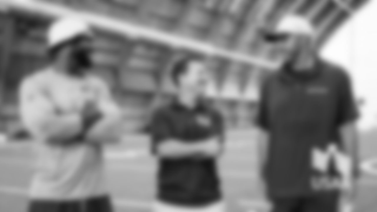 Devin Hester, Ian Rapoport and assistant general manager Ian Cunningham