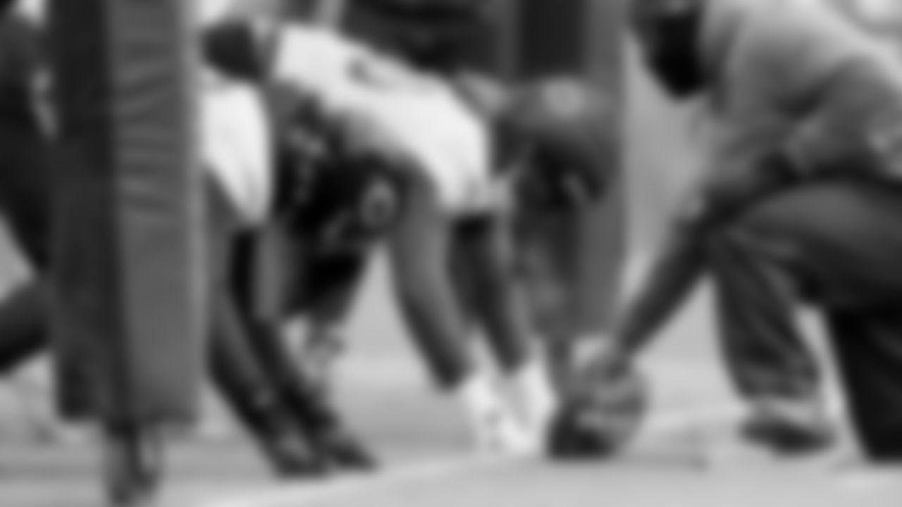 Chicago Bears players and coaches on the field for practice at Halas Hall, Thursday, January 1, 2026, in Lake Forest, Illinois.