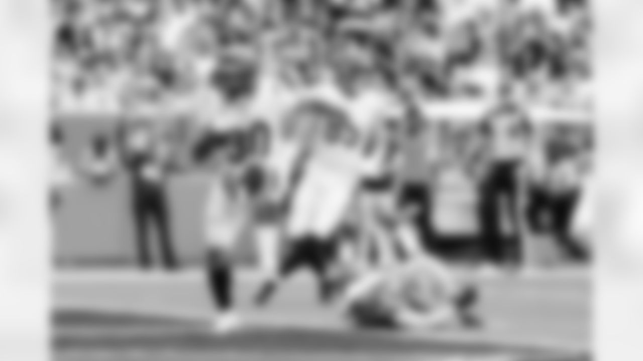 RB Chase Brown scores a touchdown during Week 16 against the Miami Dolphins at Hard Rock Stadium, Sunday, Dec. 21, 2025.