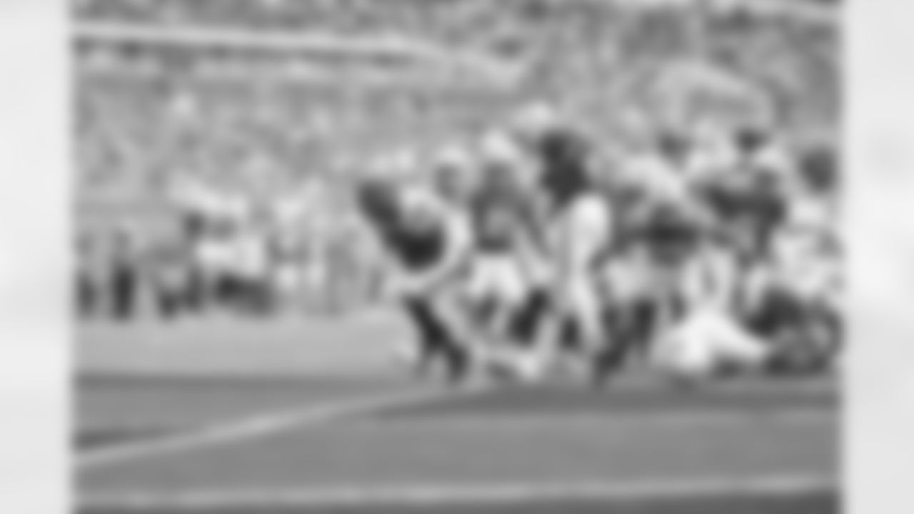 RB Samaje Perine scores a touchdown during Week 16 against the Miami Dolphins at Hard Rock Stadium, Sunday, Dec. 21, 2025.