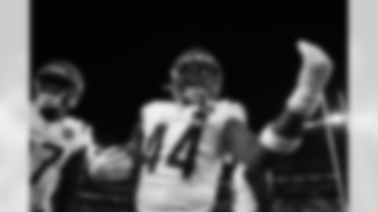 LB Demetrius Knight Jr. celebrates an interception during Week 13 against the Baltimore Ravens, Thursday, Nov. 27, 2025.