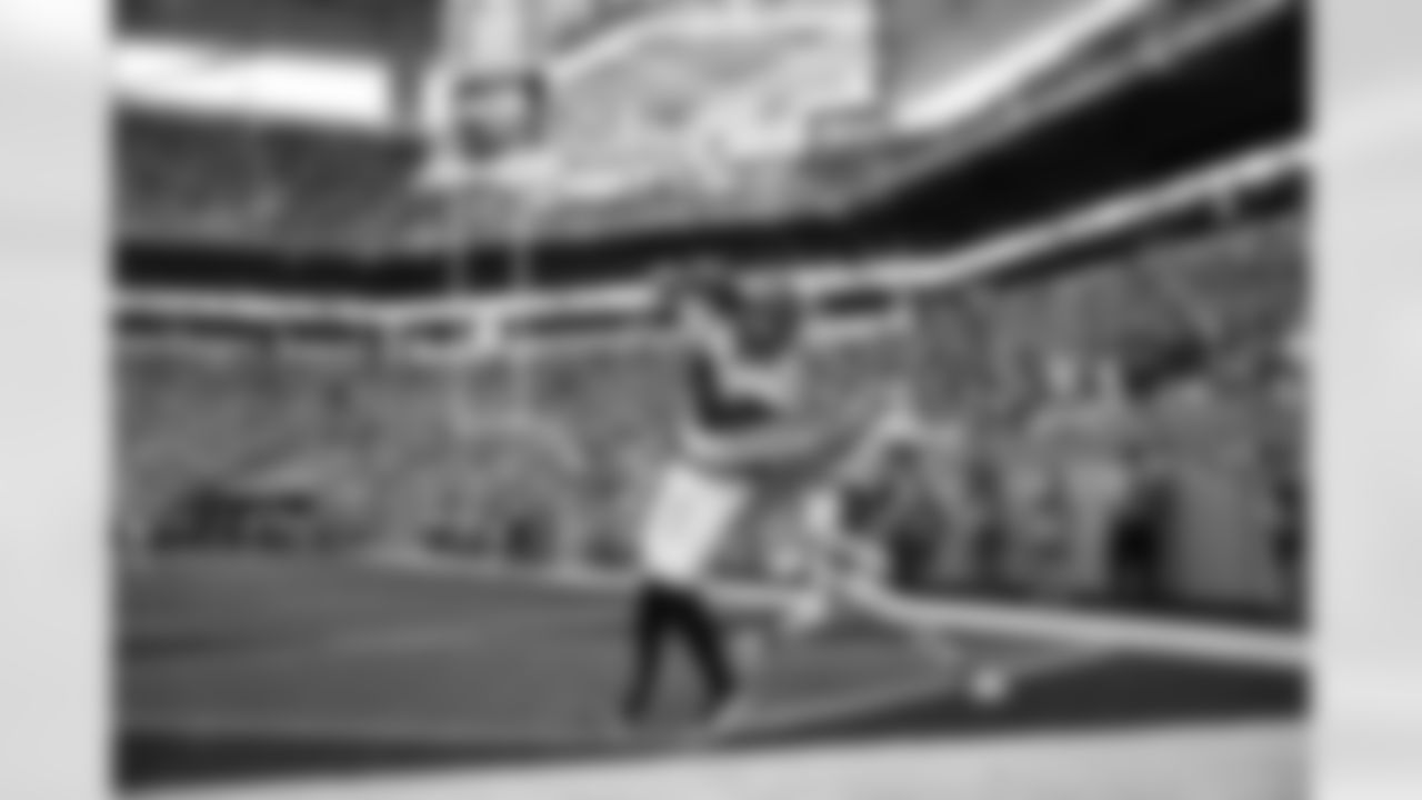 WR Tee Higgins catches a touchdown during Week 16 against the Miami Dolphins at Hard Rock Stadium, Sunday, Dec. 21, 2025.