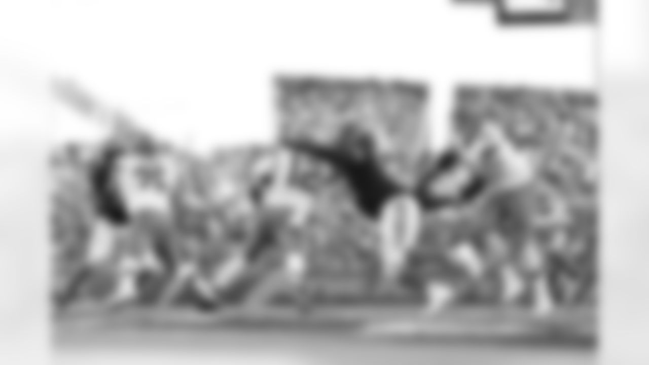 DT T.J. Slaton Jr. hits QB Shedeur Sanders during Week 18 against the Cleveland Browns, Sunday, Jan. 4, 2026.