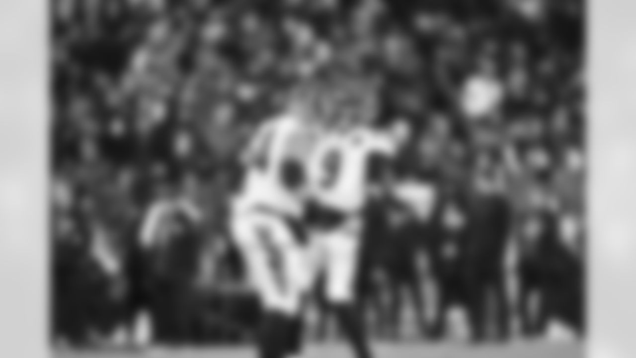 QB Joe Burrow and C Ted Karras celebrate a touchdown during Week 13 against the Baltimore Ravens, Thursday, Nov. 27, 2025.