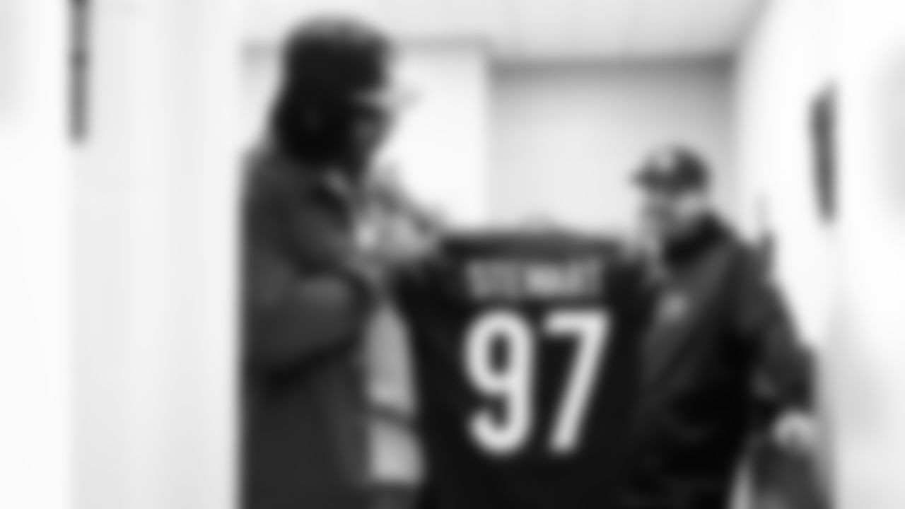EDGE Shemar Stewart receives his Bengals jersey at Paycor Stadium.