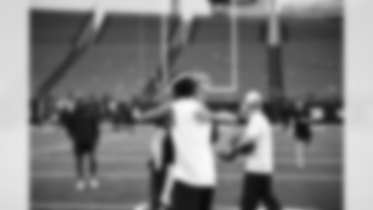 Bengals QB Joe Burrow greets Washington Commanders QB Jayden Daniels before the Bengals Week 3 Monday Night Football game against the Commanders at Paycor Stadium.