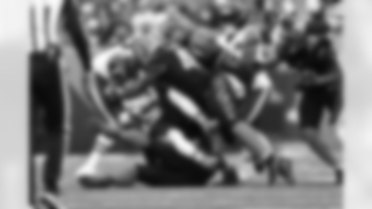 The Bengals combine to make a tackle during Week 9 against the Chicago Bears at Paycor Stadium, Sunday, Nov. 2, 2025.