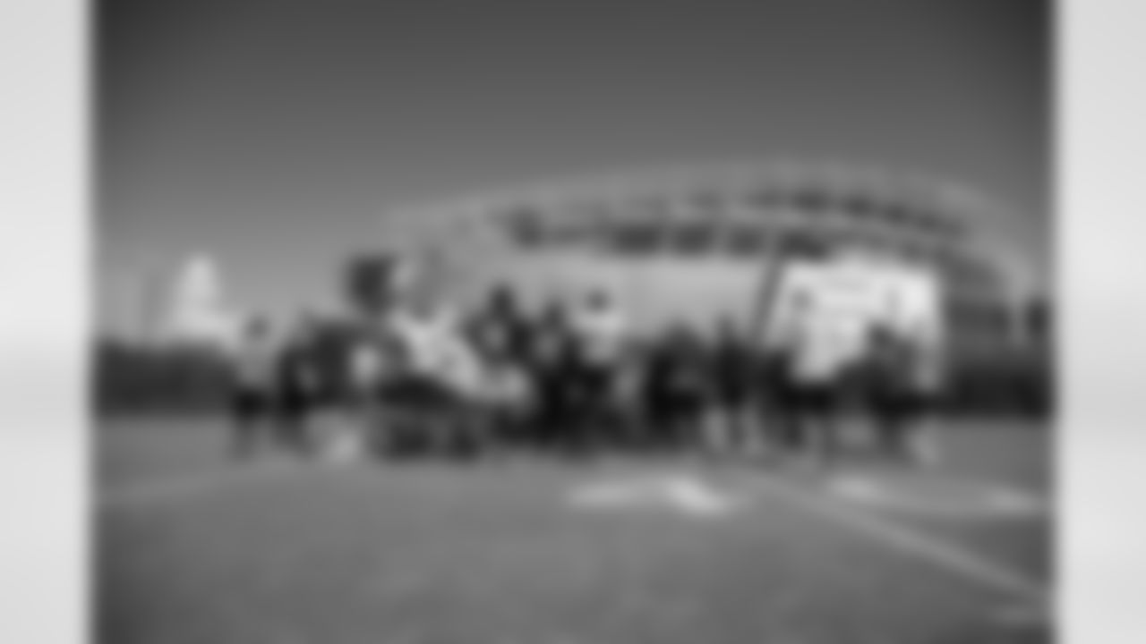 Players huddle outside Paycor Stadium at Kettering Health Practice Fields, Thursday, August 31, 2023.