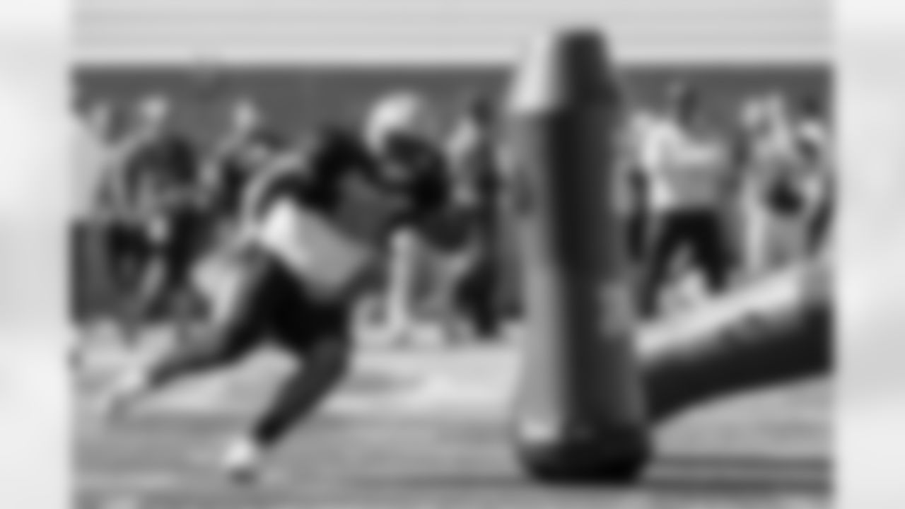 American defensive lineman Jordan Jefferson of LSU (99) runs through drills during practice for the Senior Bowl NCAA college football game, Wednesday, Jan. 31, 2024, in Mobile, Ala. (AP Photo/ Butch Dill)