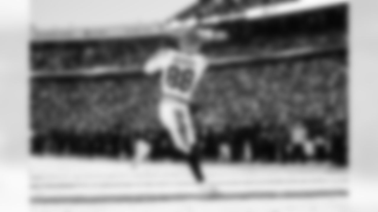 TE Mike Gesicki scores a touchdown against the Buffalo Bills during Week 14, Sunday, Dec. 7, 2025.