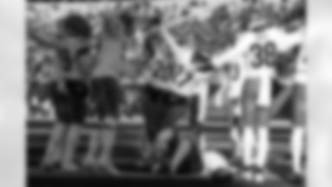 Cincinnati Bengals safety Jordan Battle (27) celebrates with teammates after intercepting a pass against the Baltimore Ravens during the first half of an NFL football game, Sunday, Dec. 14, 2025, in Cincinnati. (AP Photo/Jeff Dean)