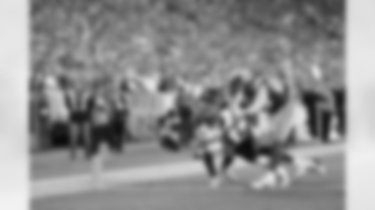 WR Ja'Marr Chase scores a fourth-quarter touchdown during Week 6 against the Packers in Green Bay, Sunday, Oct. 12, 2025.