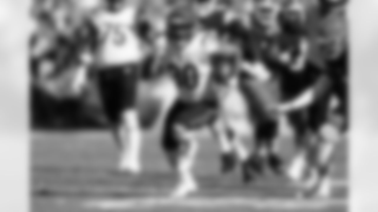 RB Chase Brown carries the ball against the Cleveland Browns, Sunday, Oct. 20, 2024.