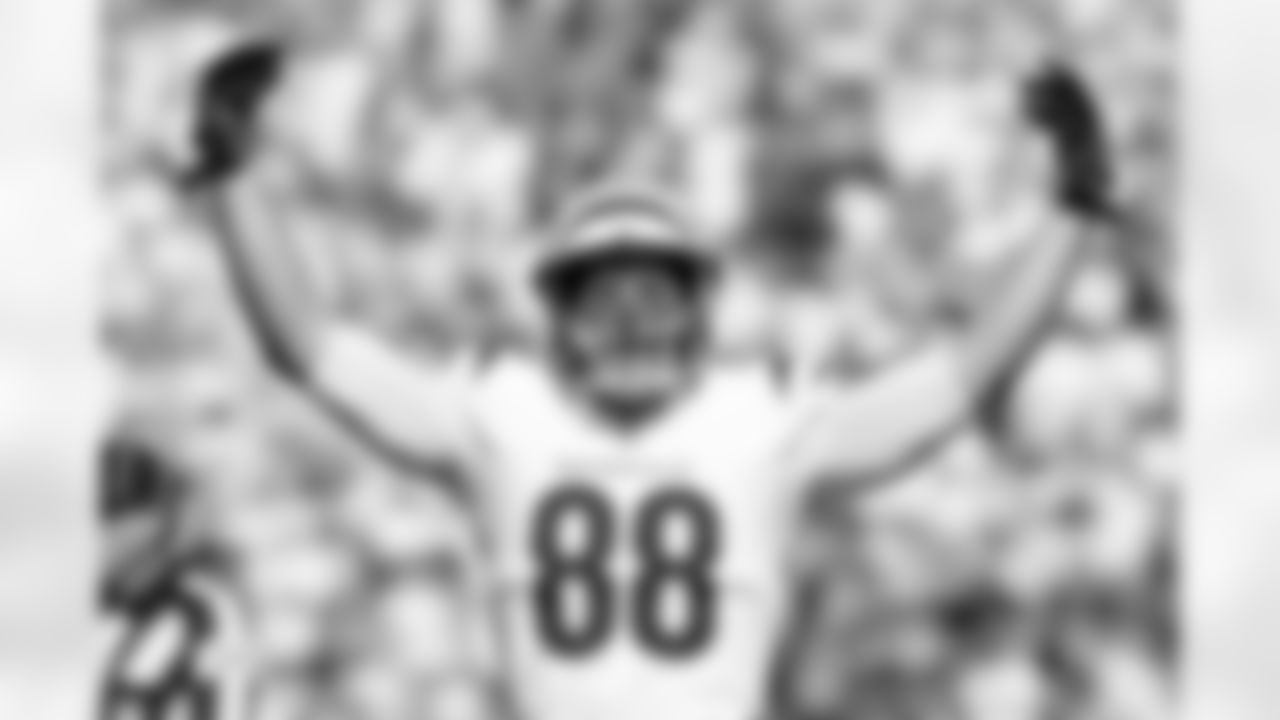 Cincinnati Bengals tight end Mike Gesicki (88) gestures during an NFL football game against the Philadelphia Eagles Sunday, Oct. 27, 2024, in Cincinnati.