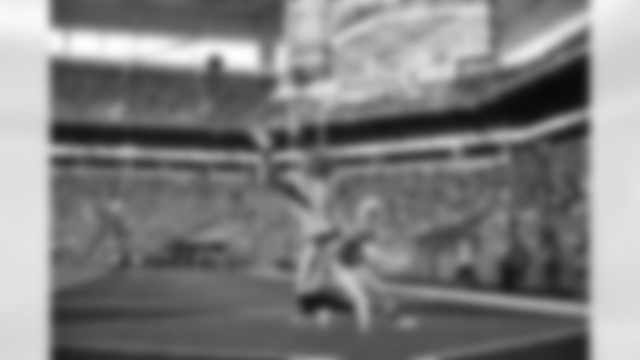 WR Tee Higgins catches a touchdown during Week 16 against the Miami Dolphins at Hard Rock Stadium, Sunday, Dec. 21, 2025.