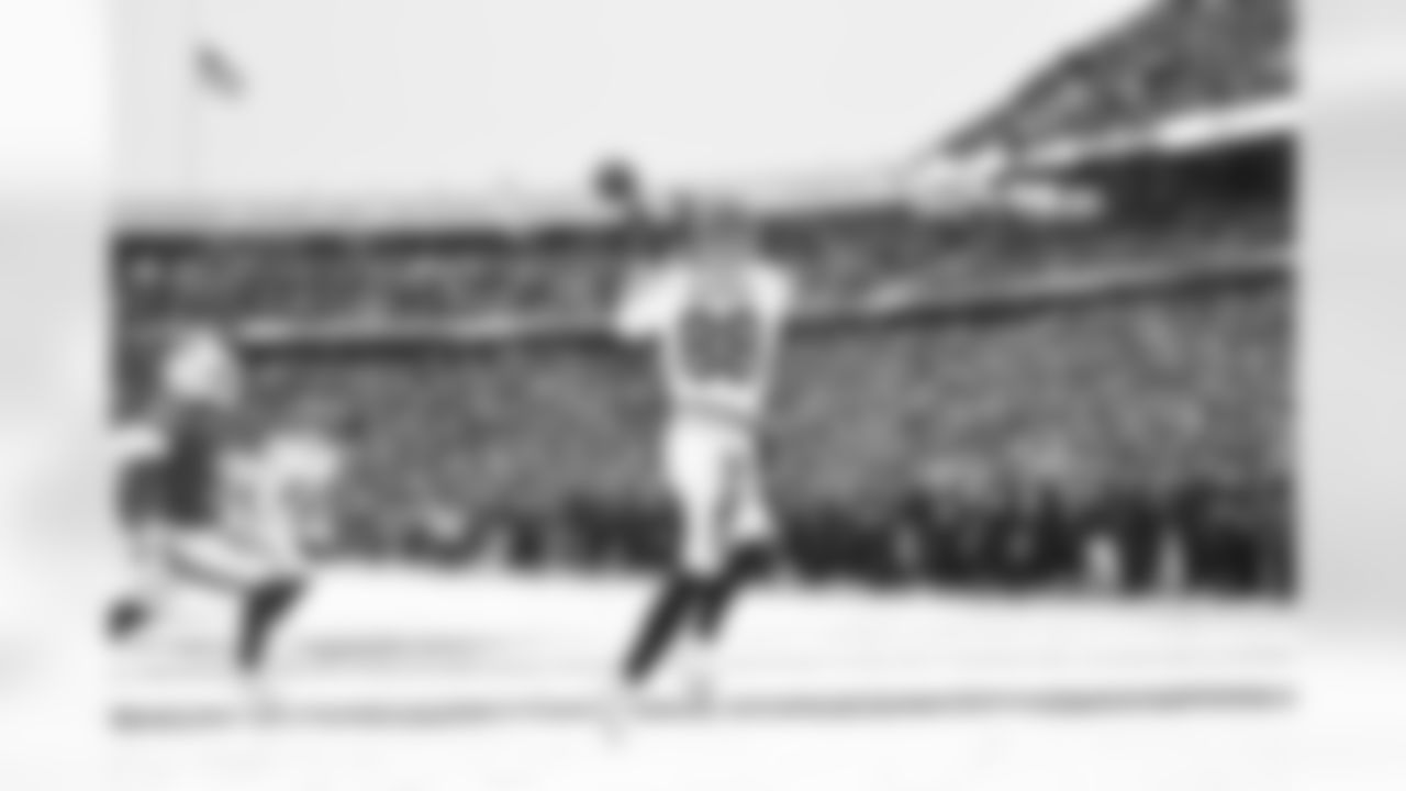 TE Mike Gesicki scores a touchdown during Week 14 against the Buffalo Bills, Sunday, Dec. 7, 2025.