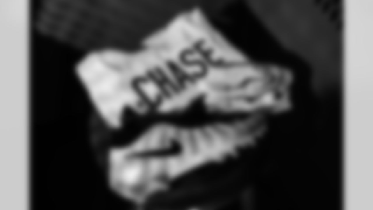 WR Ja'Marr Chase's jersey, cleats and gloves in the locker room ahead of Week 13 against the Baltimore Ravens, Thursday, Nov. 27, 2025.