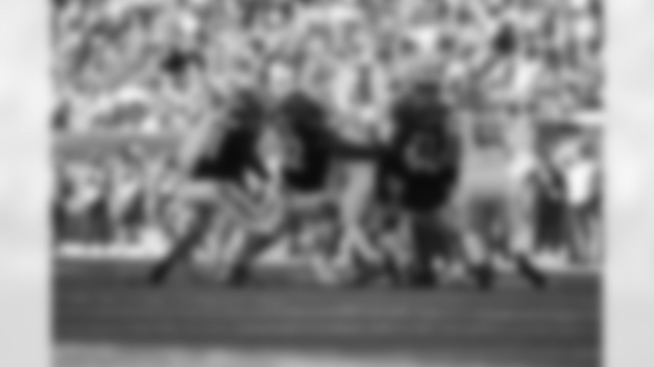 DT B.J. Hill makes a tackle during Week 5 against the Detroit Lions, Sunday, Oct. 5, 2025.