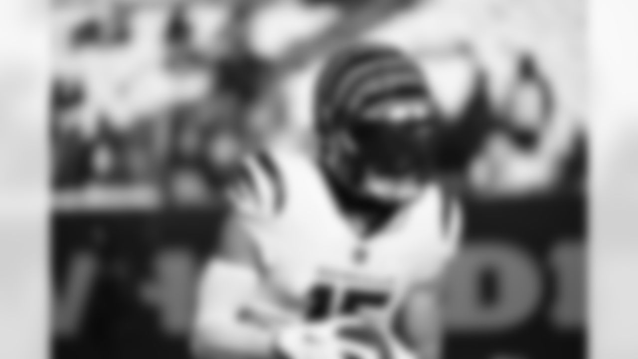 WR Charlie Jones warms up ahead of Week 15 against the Ravens at Paycor Stadium, Sunday, Dec. 14, 2025.