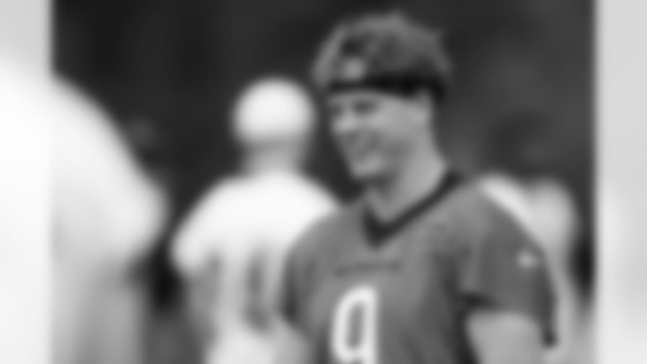QB Joe Burrow smiles during phase two of offseason workouts at Kettering Health Practice Fields, Wednesday, May 21, 2025.