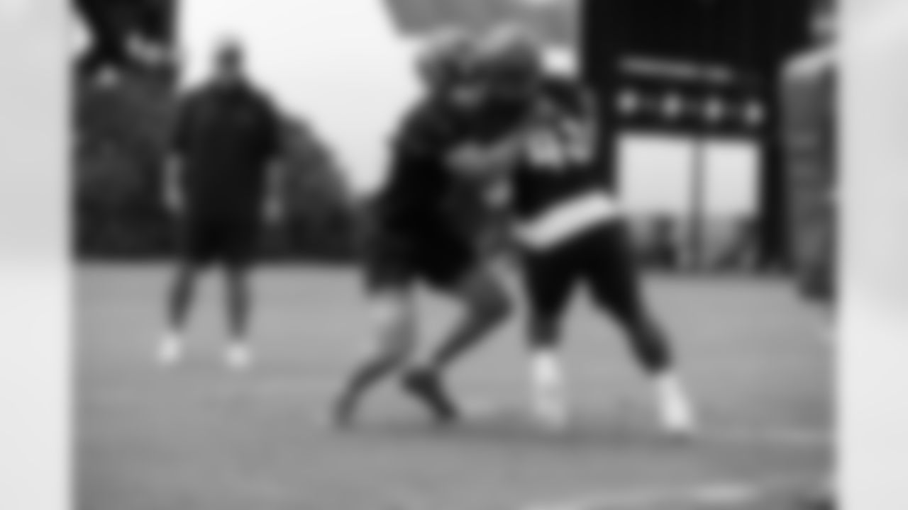 LBs Logan Wilson and Maema Njongmeta run a drill during Day Three of Bengals OTAs at Kettering Health Practice Fields, Thursday, May 29, 2025.