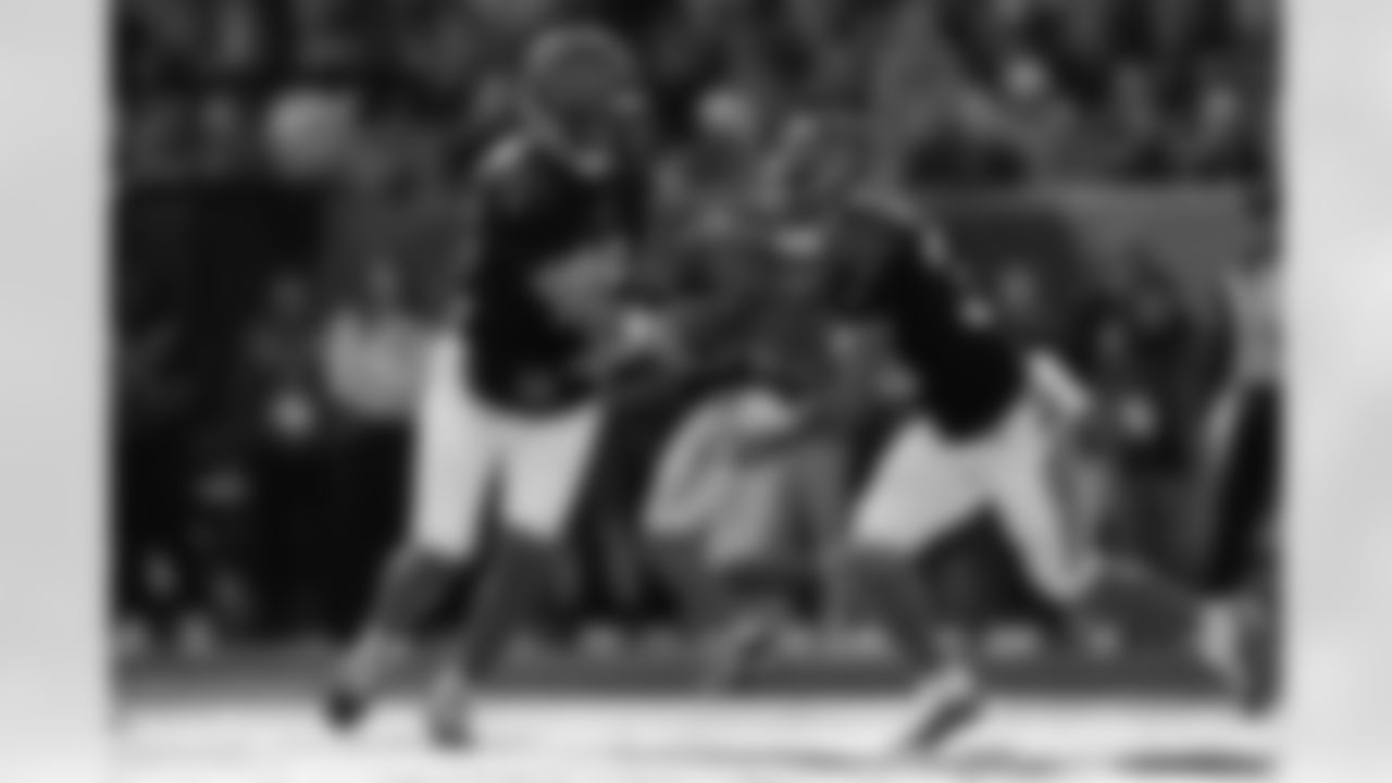 Cincinnati Bengals running back Chase Brown (30) receives the hand off during an NFL football game against the New England Patriots on Sunday, November 23, 2025 in Cincinnati, Ohio.