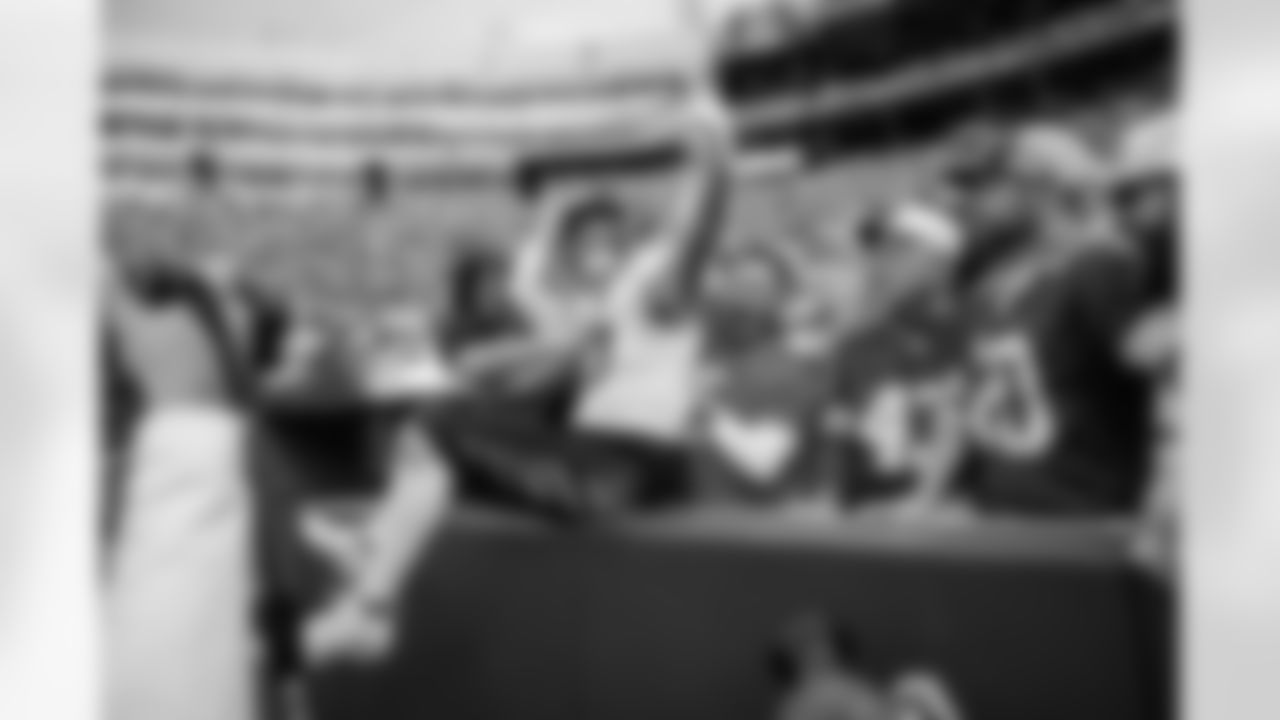 TE Tanner Hudson celebrates a touchdown in Week 6 against the Green Bay Packers.